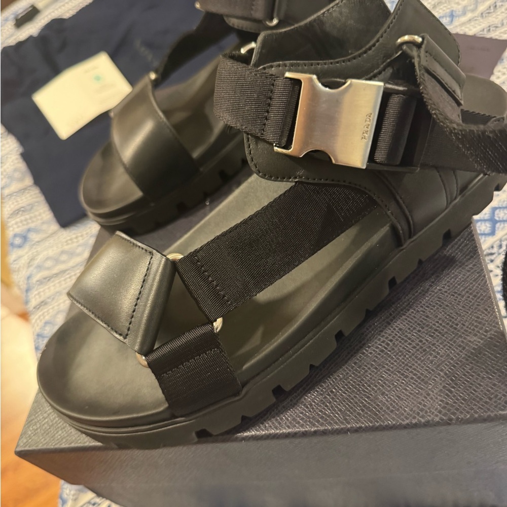 Prada Black men’s leather Sandals with Silver Buckles.